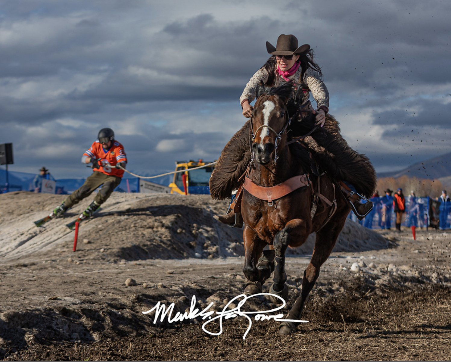 Skijoring. Woman riding horse pulling skiier